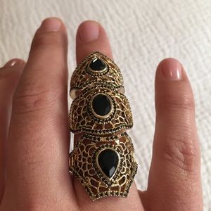 Gold and onyx multi knuckle ring